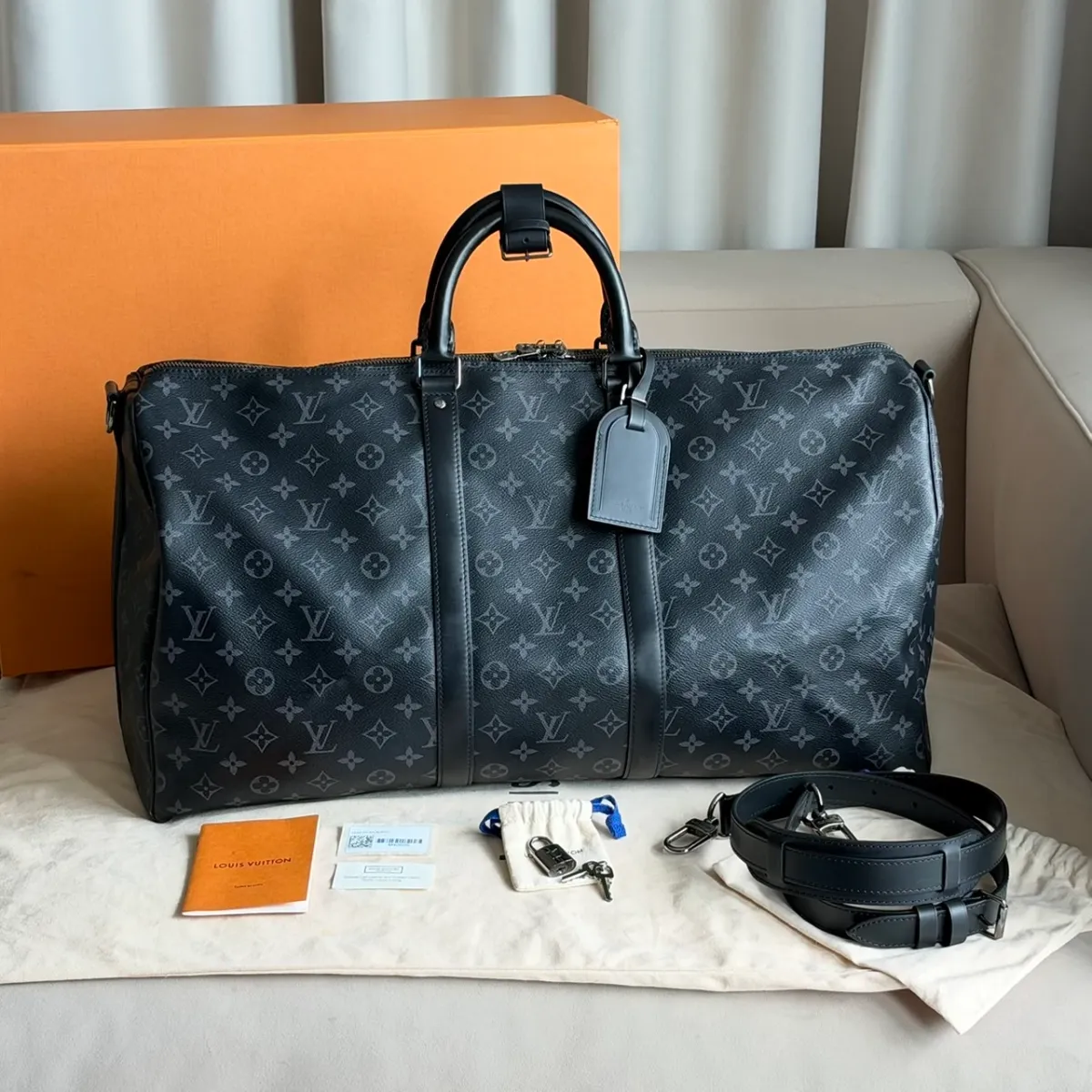 LV Keepall Bandoulière 55 Monogram Eclipse Microchip